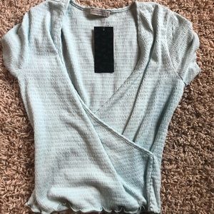 Paper Crane brand cropped cross over top, light blue, size L